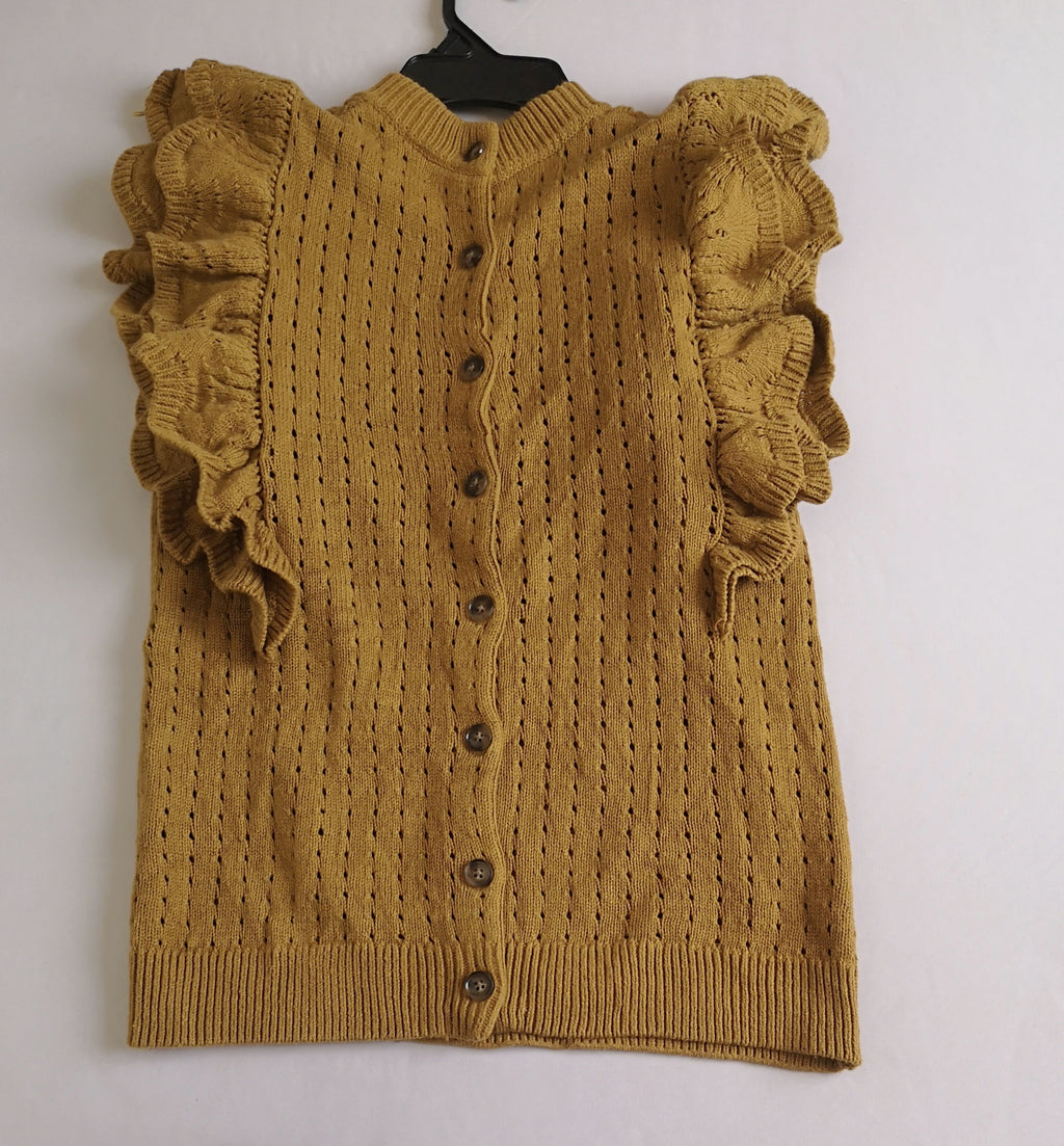 Blusa con botones atrás