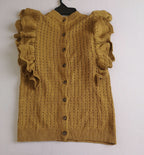Blusa con botones atrás