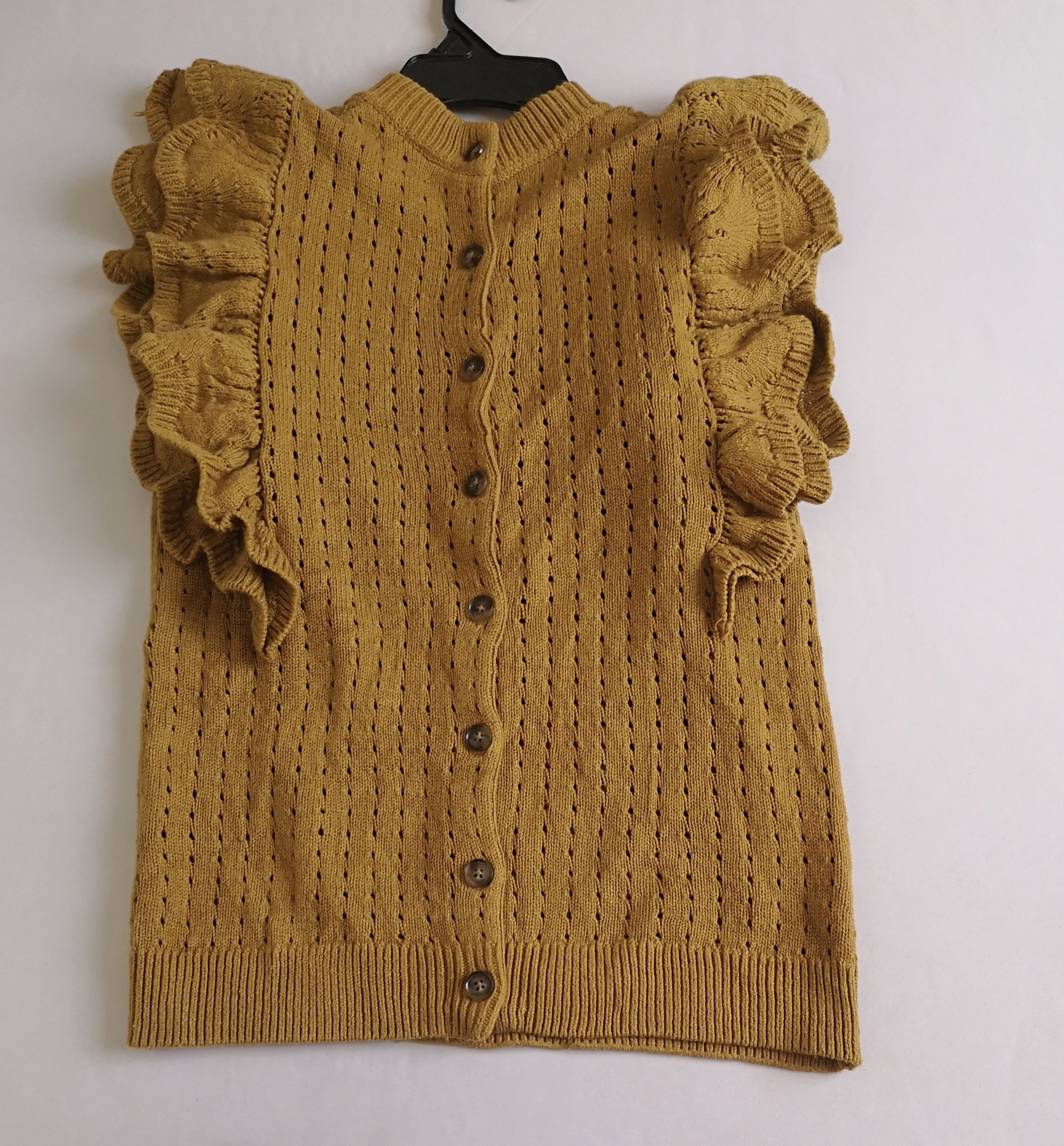 Blusa con botones atrás