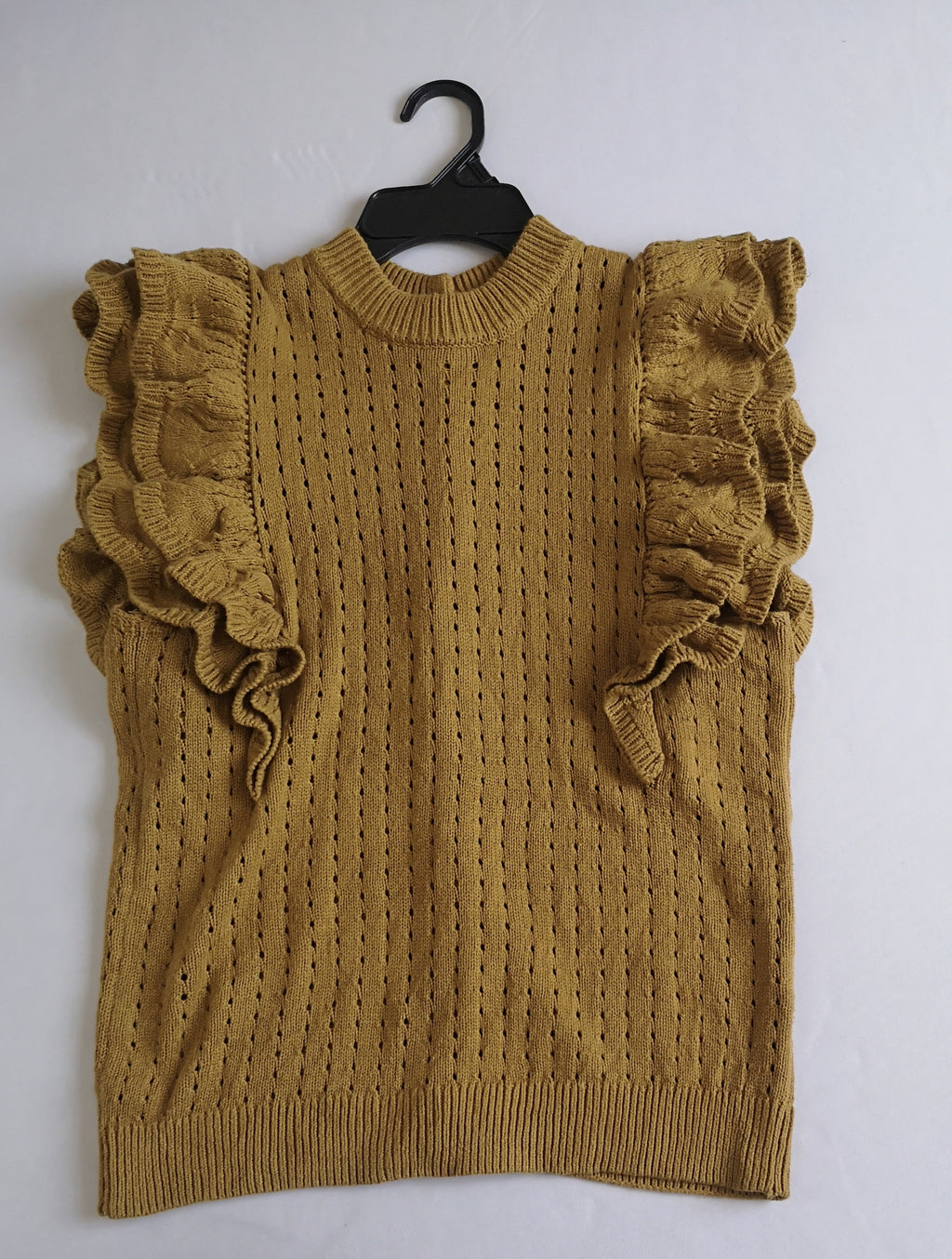 Blusa con botones atrás