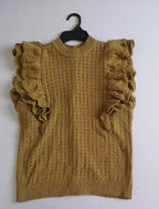 Blusa con botones atrás