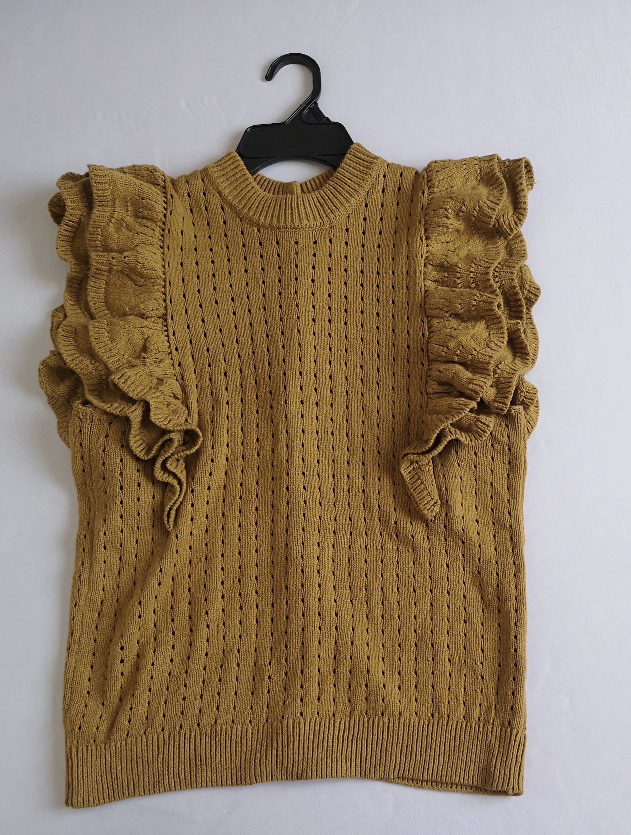 Blusa con botones atrás