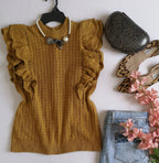 Blusa con botones atrás