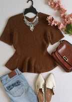 Blusa tipo peplum tejida