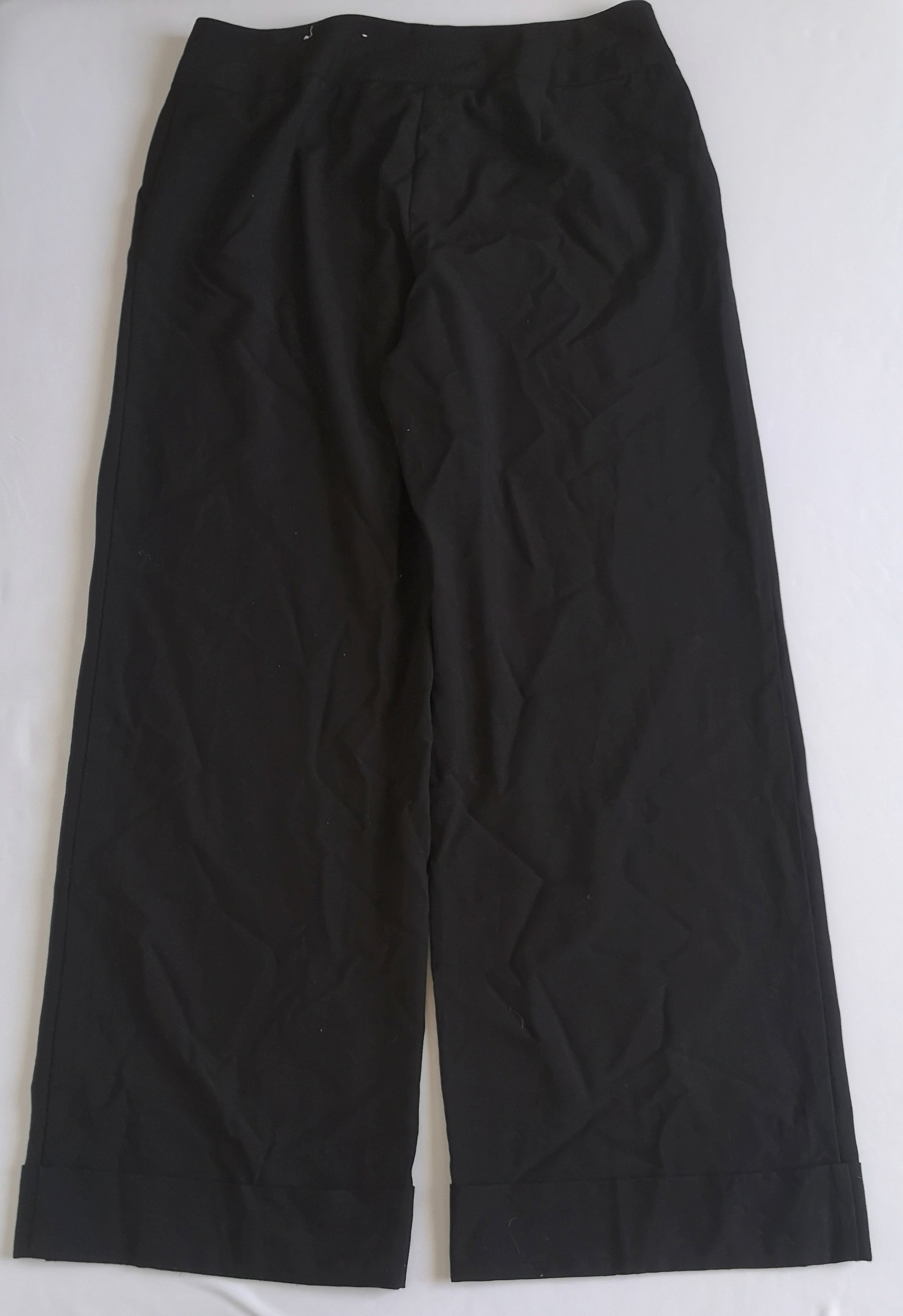 Pantalón tipo palazzo con blusa tejida