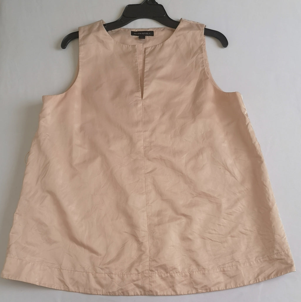Blusa holgada de abajo y pantalón corte recto
