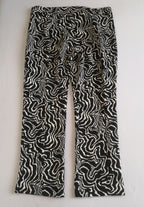 Blusa holgada de abajo y pantalón corte recto