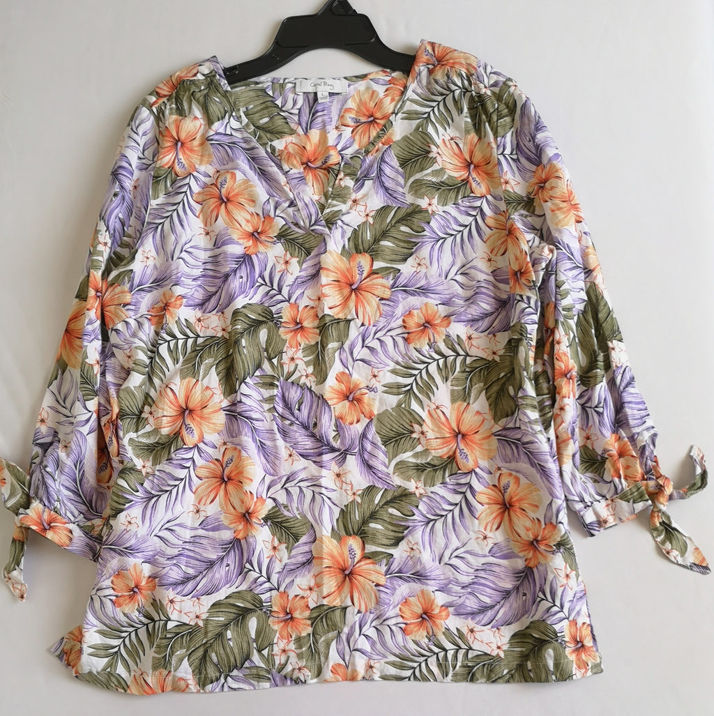 Blusa de lino y short con bolsas