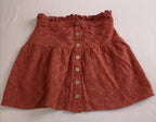 Blusa con moña y falda de algodón