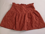 Blusa con moña y falda de algodón