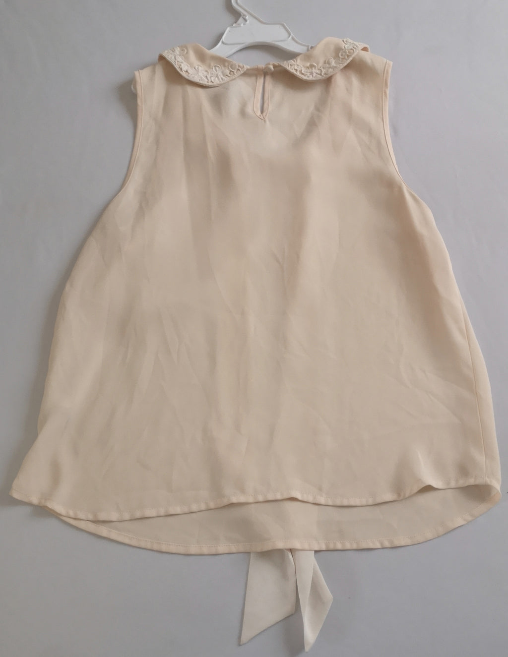 Blusa con moña y falda de algodón