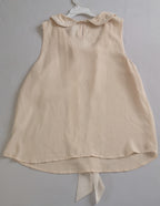 Blusa con moña y falda de algodón