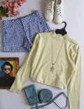 Short con blusa cuello alto