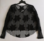 Chaleco abierto de atrás con blusa de tul