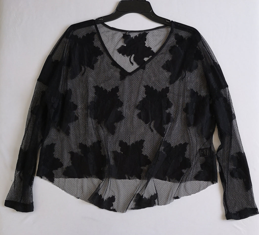 Chaleco abierto de atrás con blusa de tul