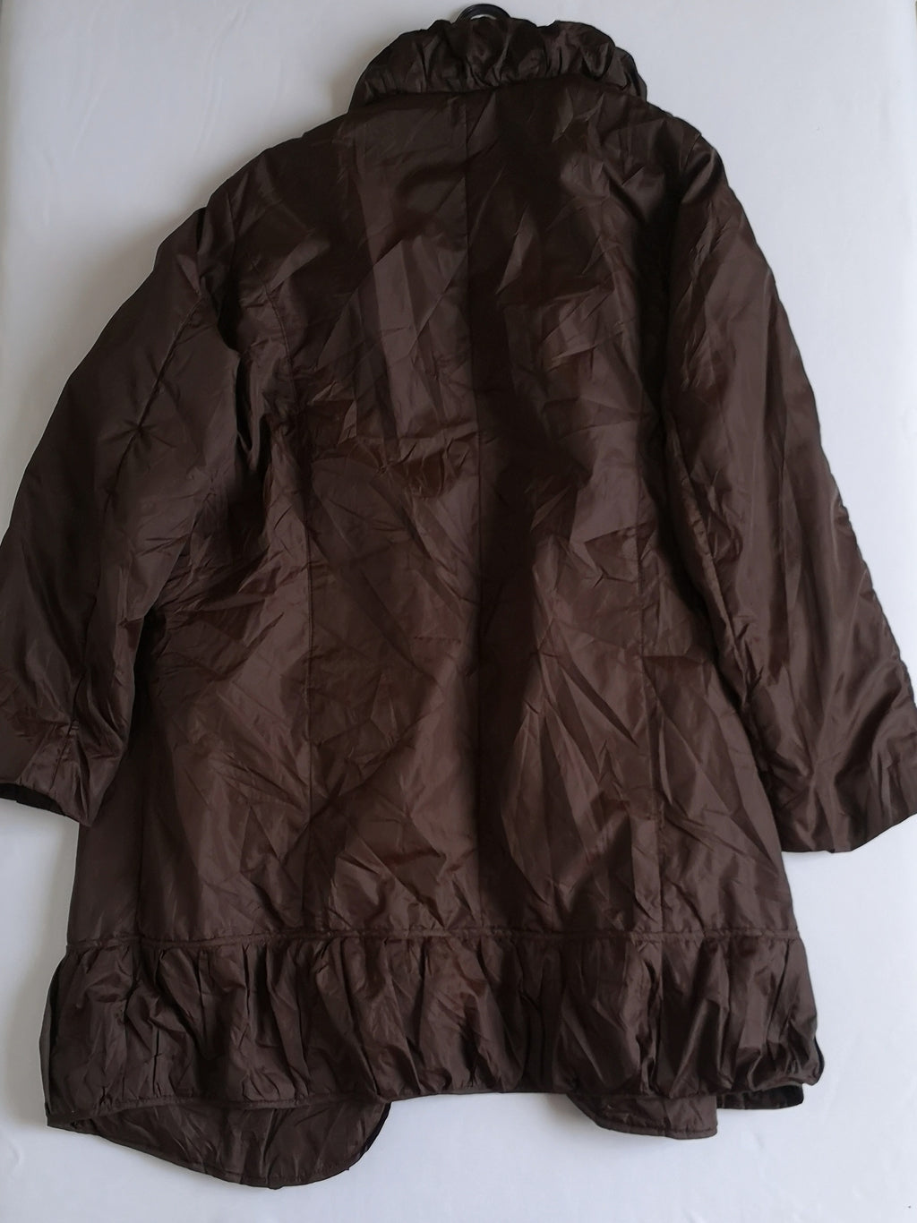 Abrigo tipo impermeable