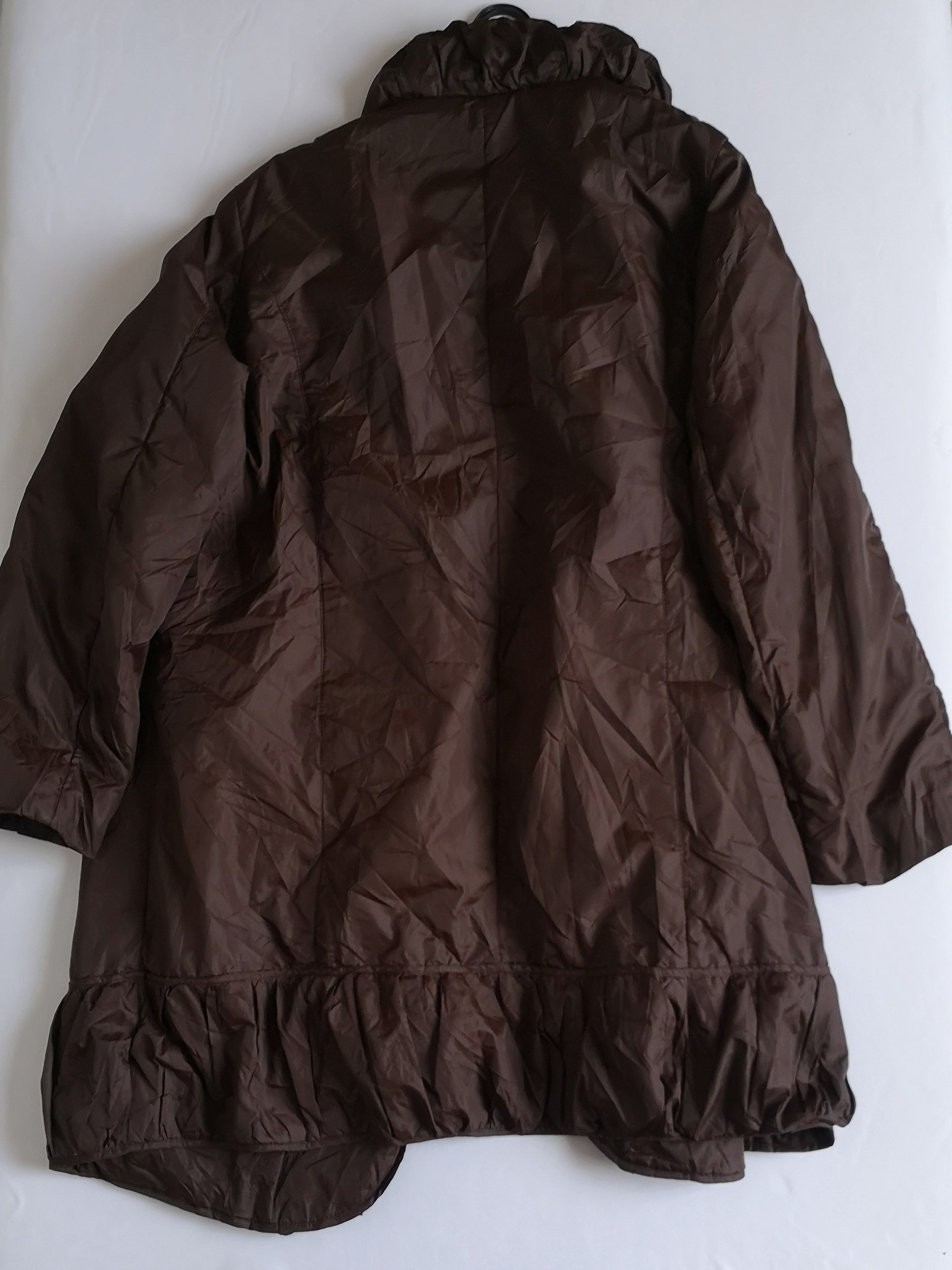 Abrigo tipo impermeable