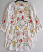 Blusa larga bordada