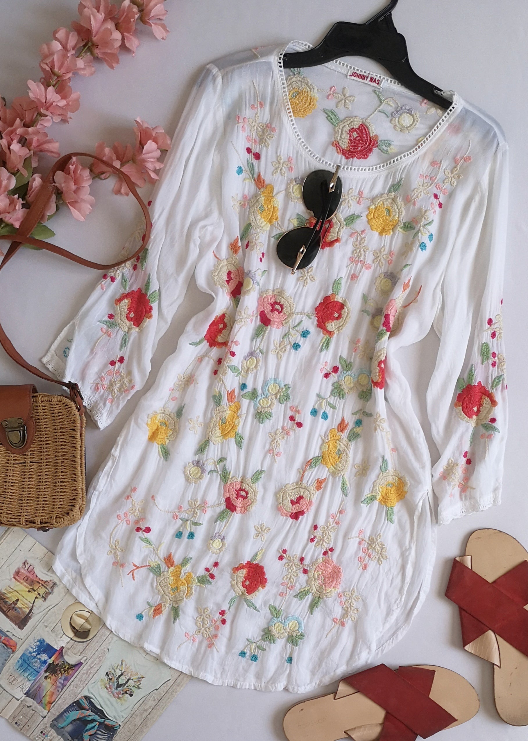 Blusa larga bordada