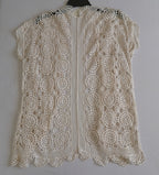 Cardigan tipo crochet con vestido de tirantes