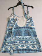 Cardigan tipo crochet con vestido de tirantes