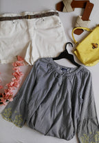 Short cintura alta con blusa bordada