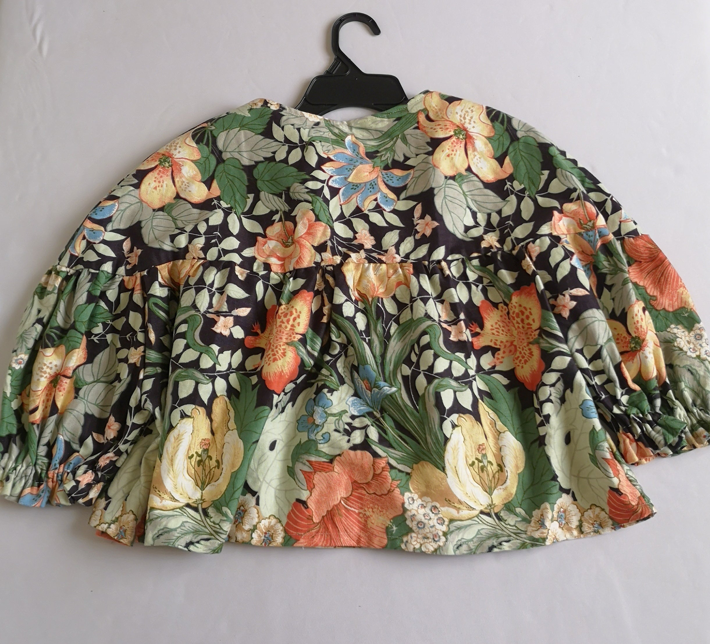 Blusa corta holgada de abajo