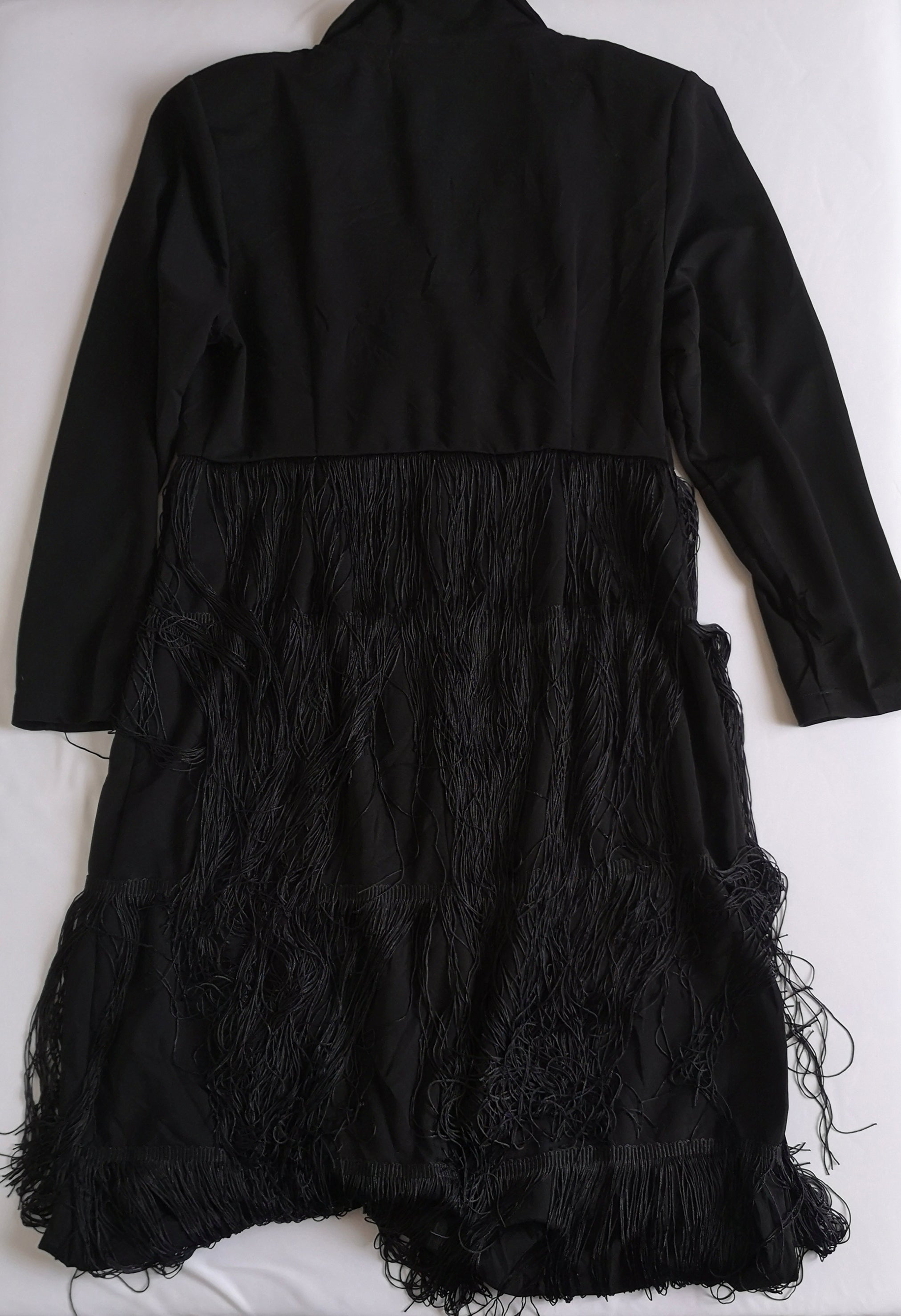 Vestido con flecos