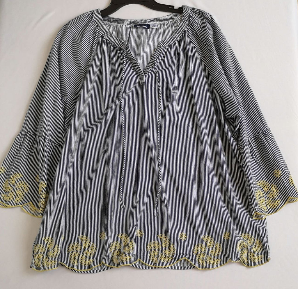 Short cintura alta con blusa bordada