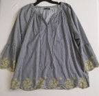 Short cintura alta con blusa bordada