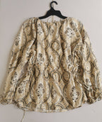 Blusa con cintas tipo peplum