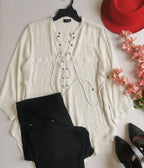 Blusa con cinto