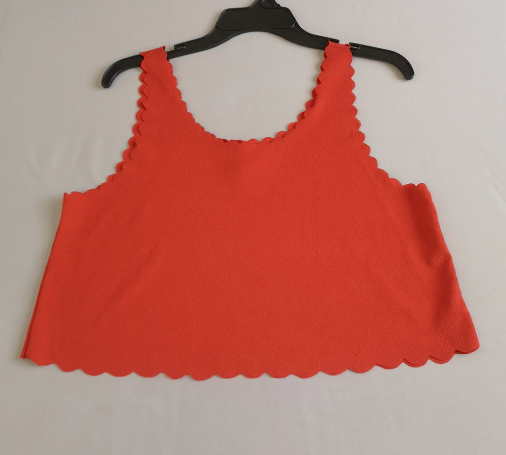 Blusa corta y falda con paletones