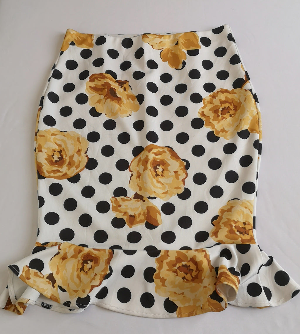 Falda tipo sirena con blusa traslapada cerrada
