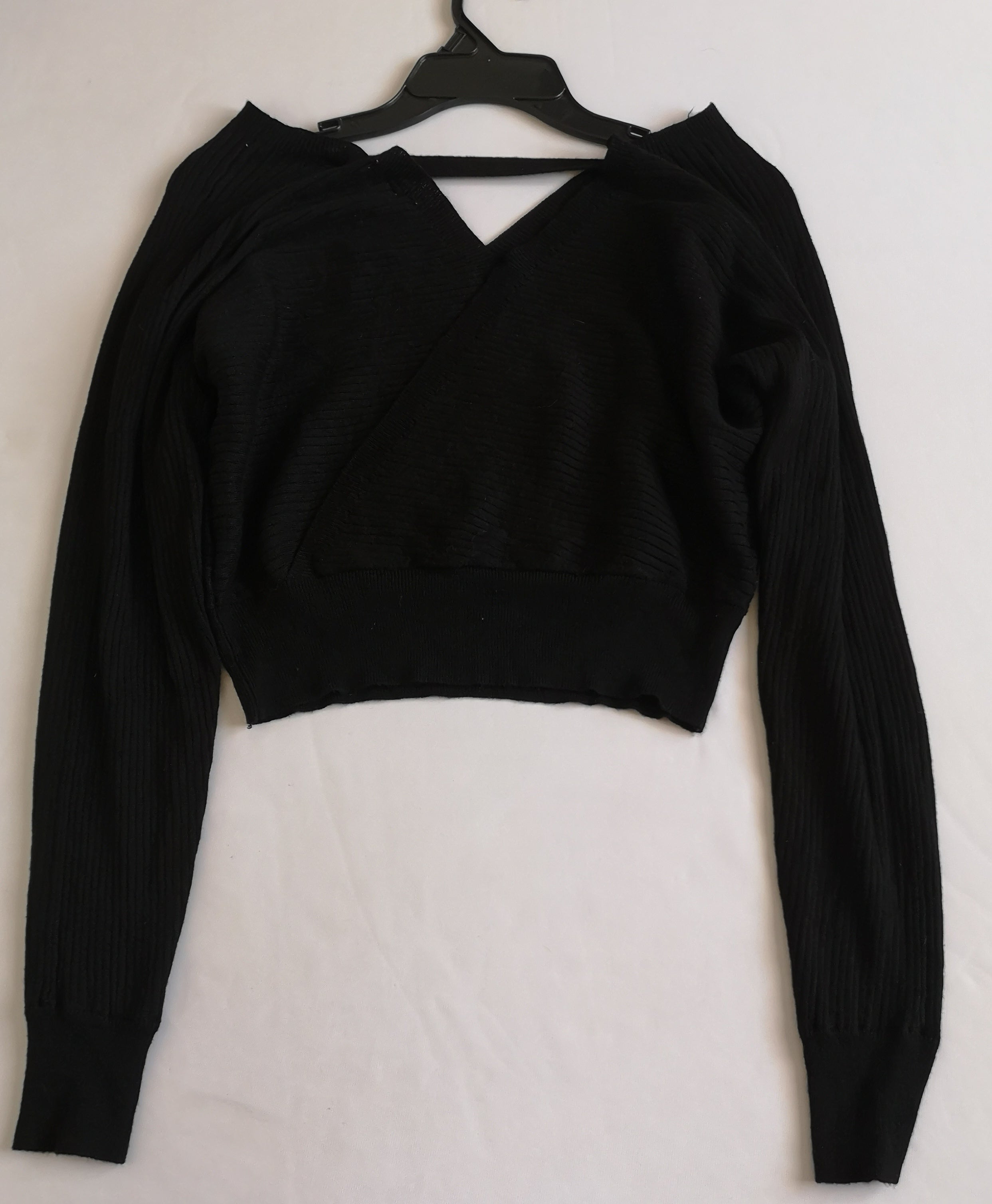Falda tipo sirena con blusa traslapada cerrada