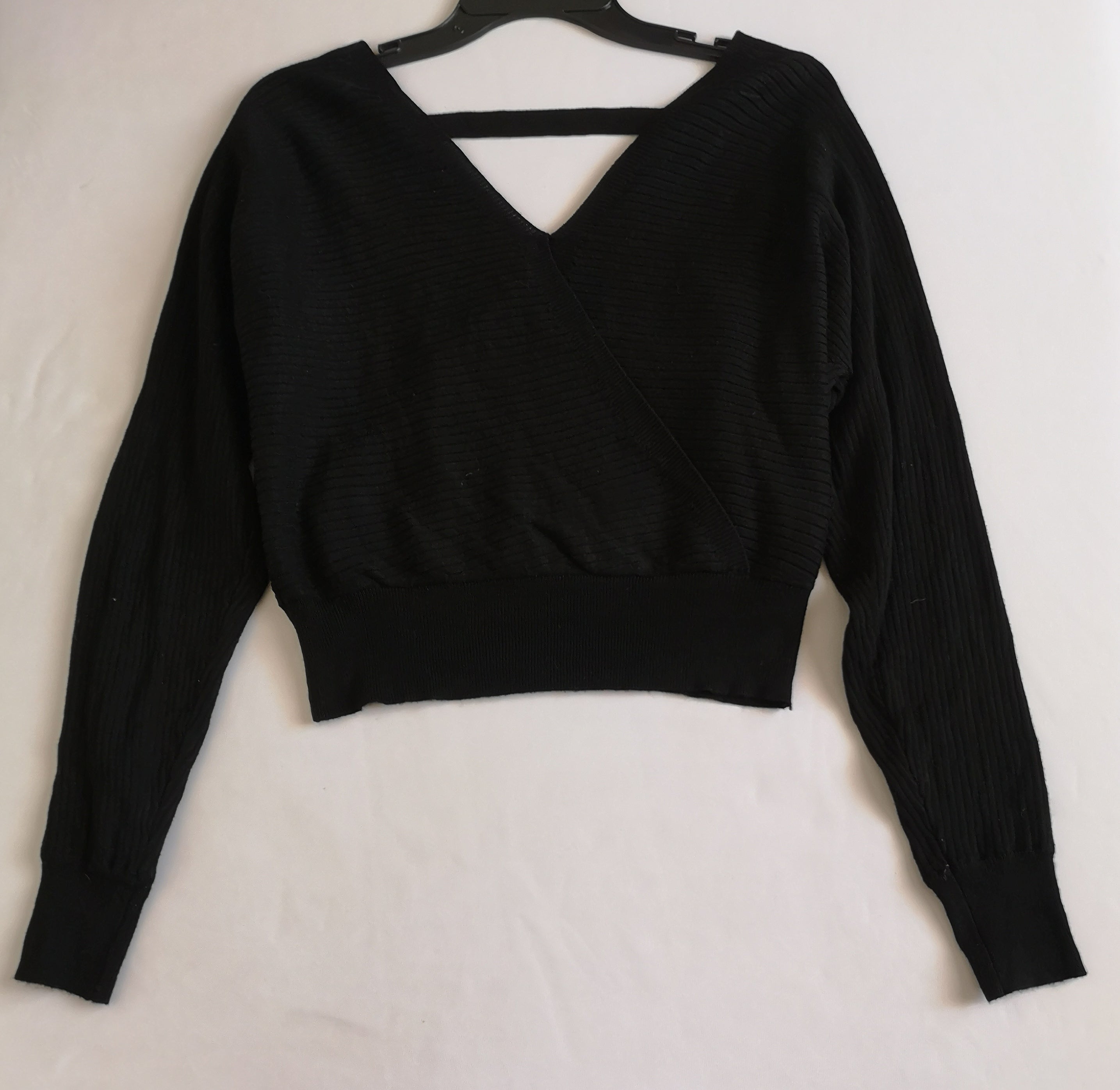 Falda tipo sirena con blusa traslapada cerrada