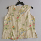 Falda midi con bolsas y blusa de seda