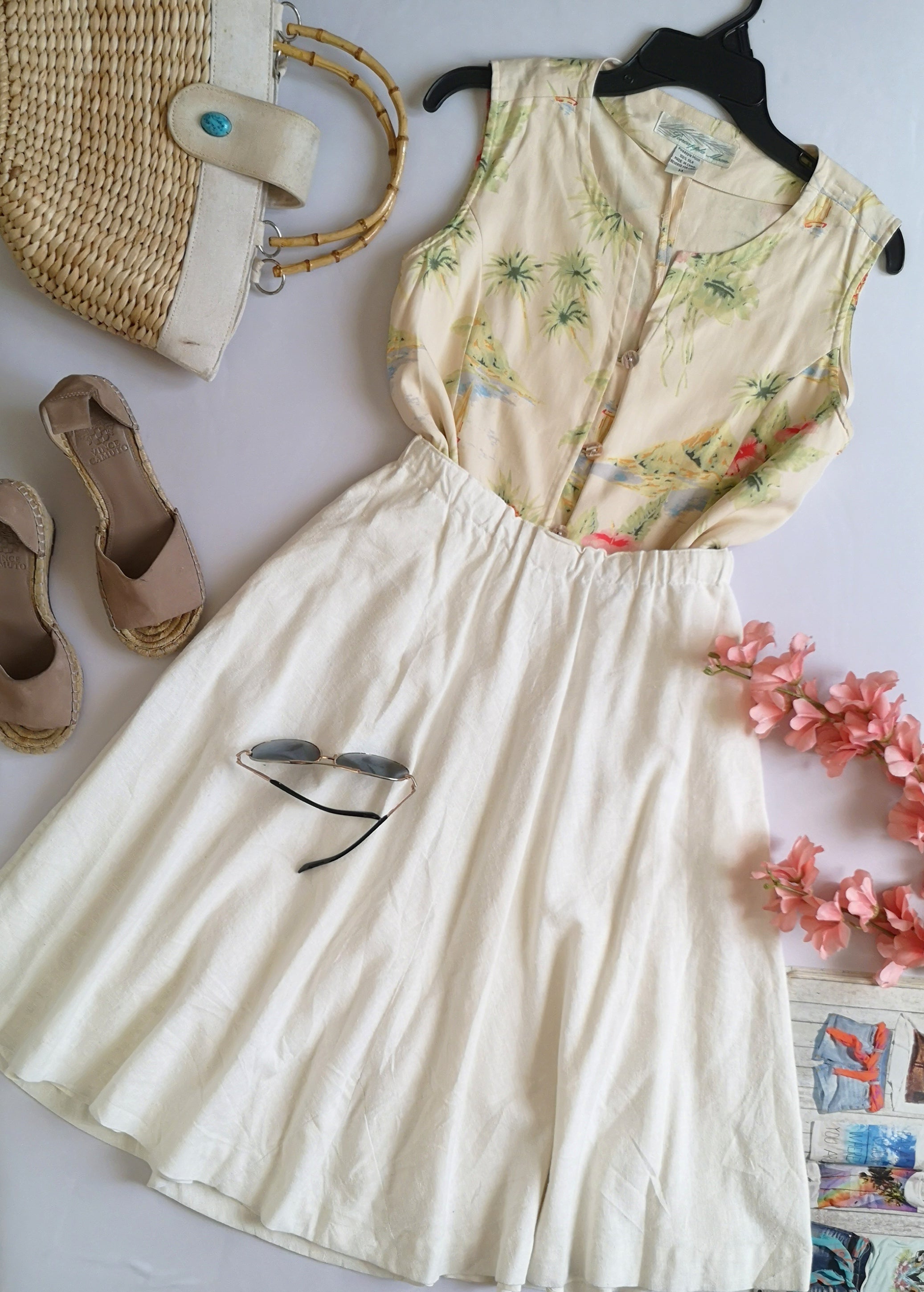Falda midi con bolsas y blusa de seda
