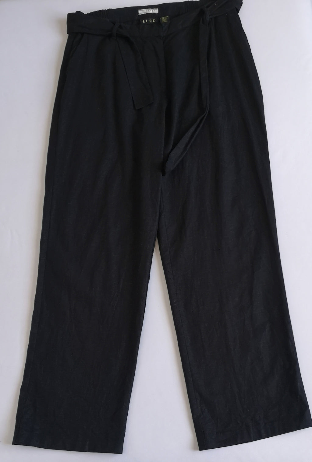 Blusa cuello cerrado con pantalón lino