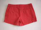 Short de gabardina y blusa con olanes adelante