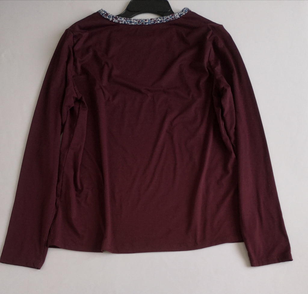 Jeans cintura alta corte recto con blusa manga larga
