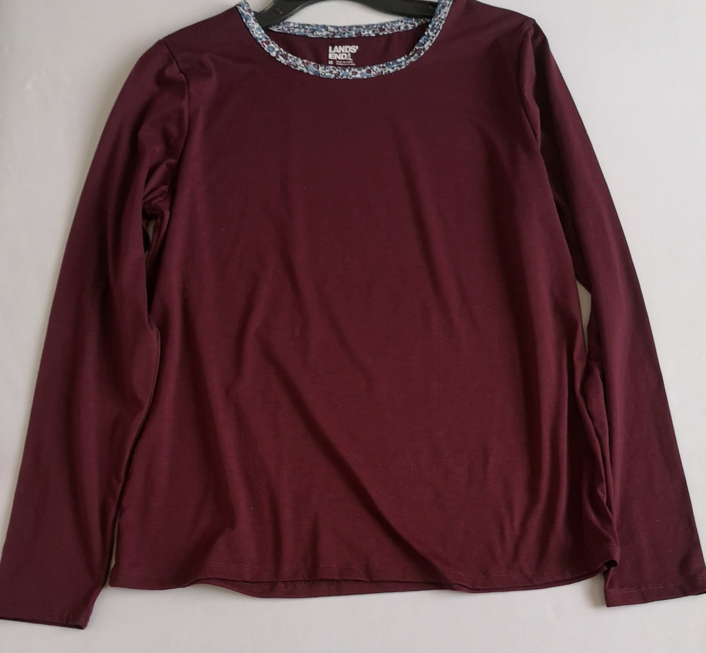 Jeans cintura alta corte recto con blusa manga larga