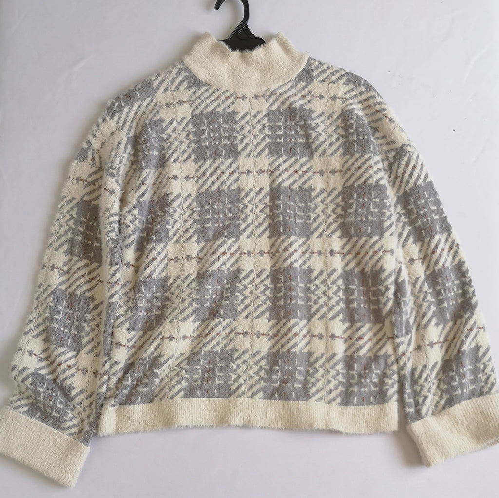 Sueter cuello cerrado tipo angora