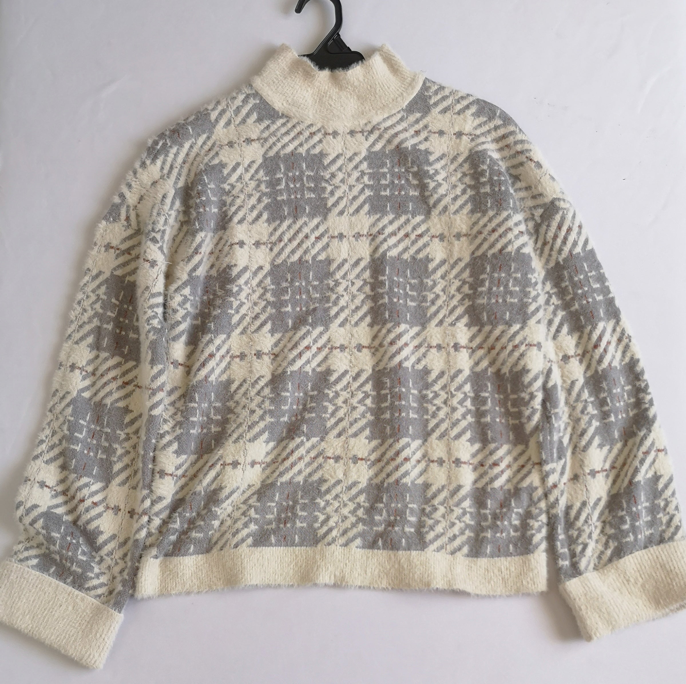 Sueter cuello cerrado tipo angora