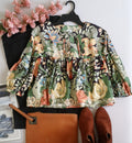 Blusa corta holgada de abajo