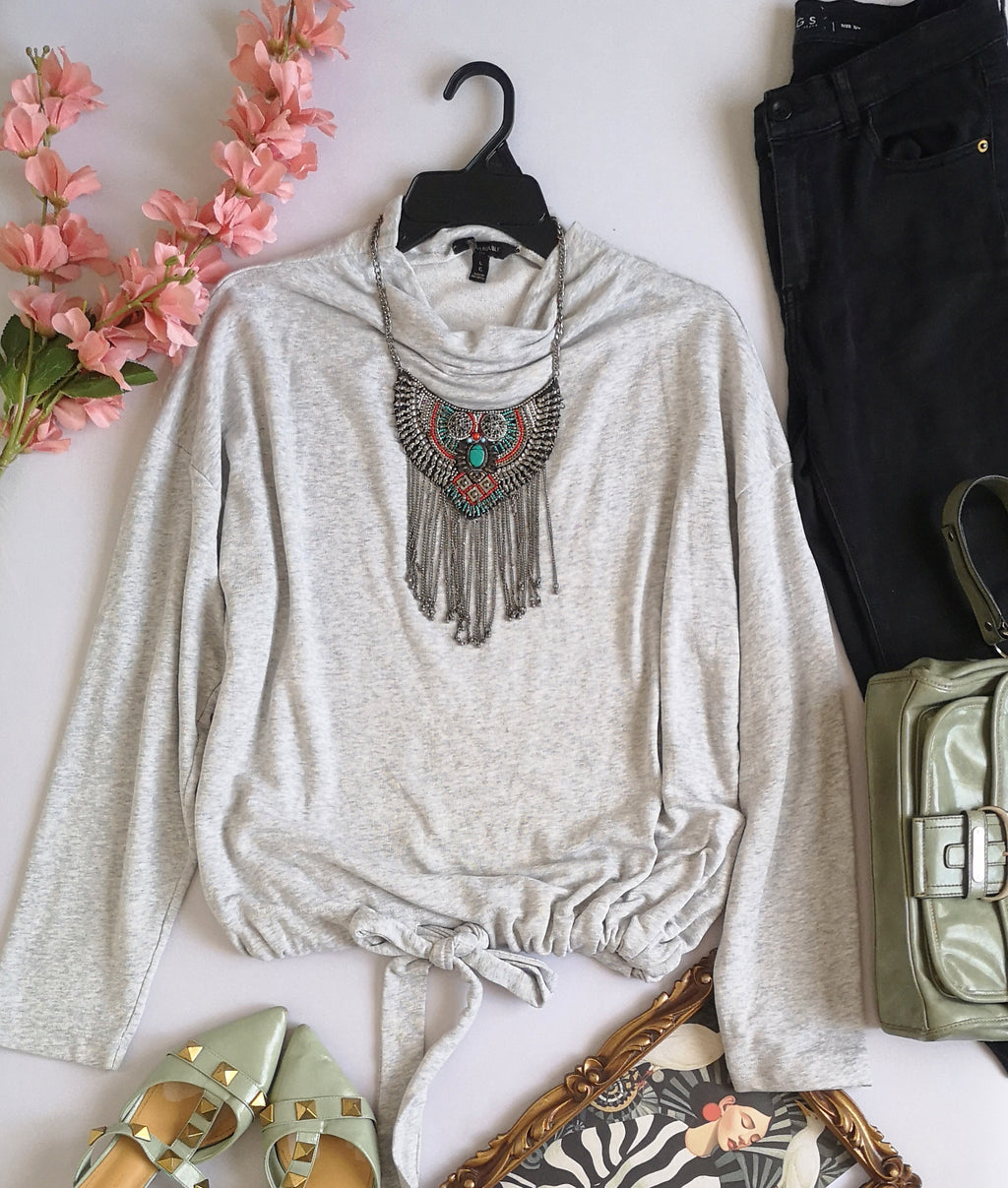 Blusa con cinta abajo