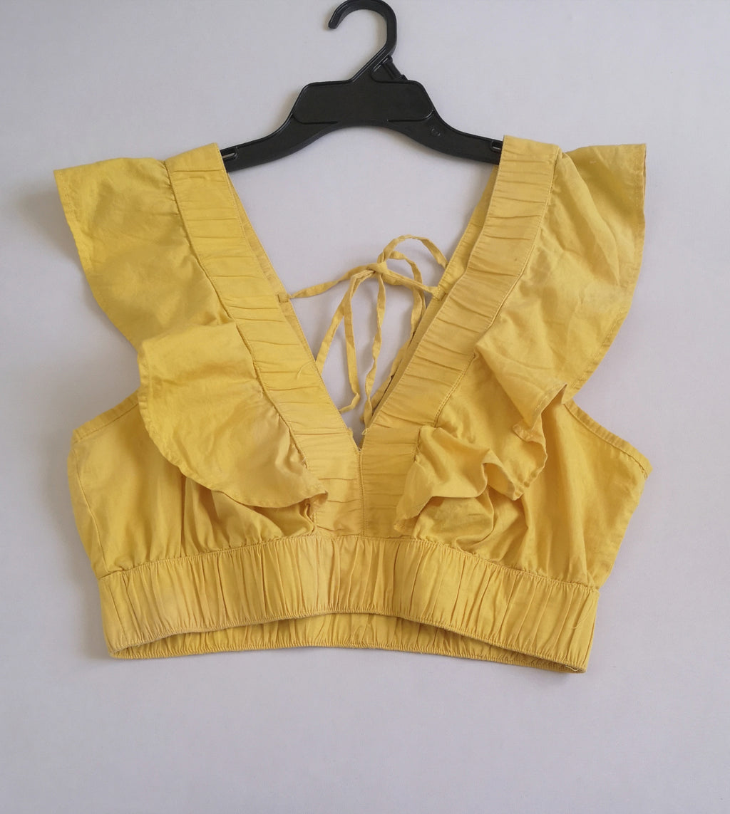 Top con olanes con falda midi ⚓