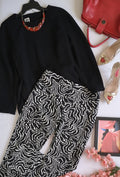 Blusa larga con pantalón corte recto