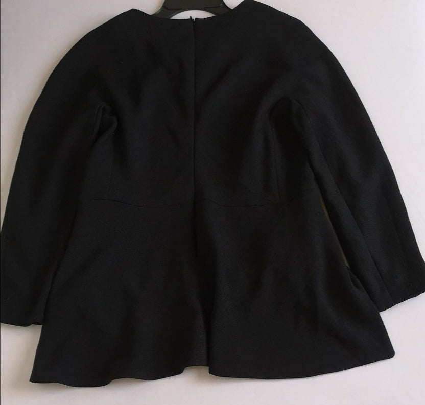 Blusa larga con pantalón corte recto