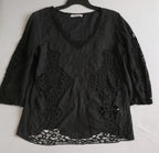 Palazzo corrugado con blusa bordada
